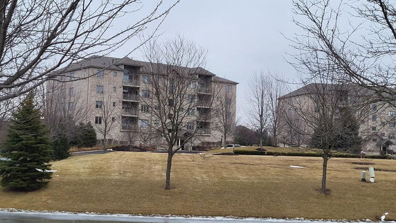 Front view of a multi-story apartment building.