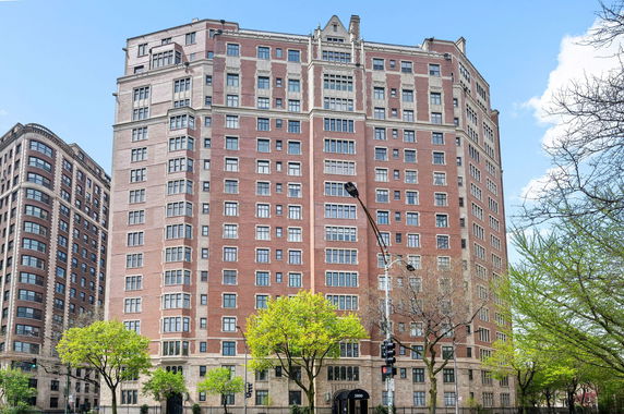 Front view of a multi-story brick building.