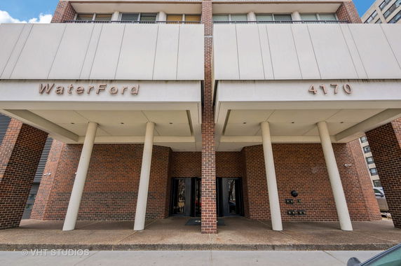 Front view of a building entrance with brick facade and labeled 'Waterford 4170.'