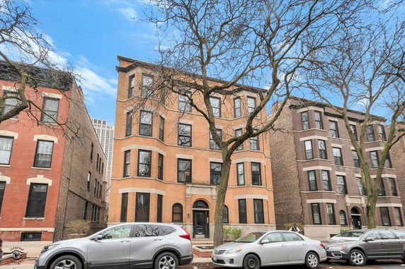 Front view of a multi-story brick building.