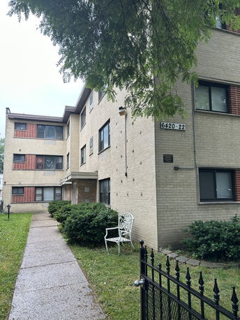 Front view of a multi-story brick building