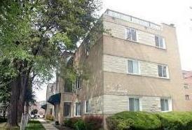 Front view of a multi-story residential building.