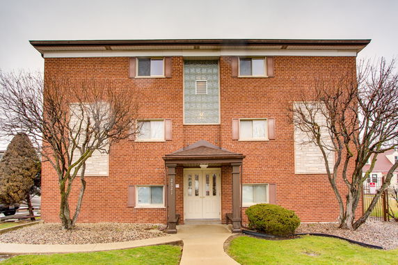 Front view of a three-story brick building
