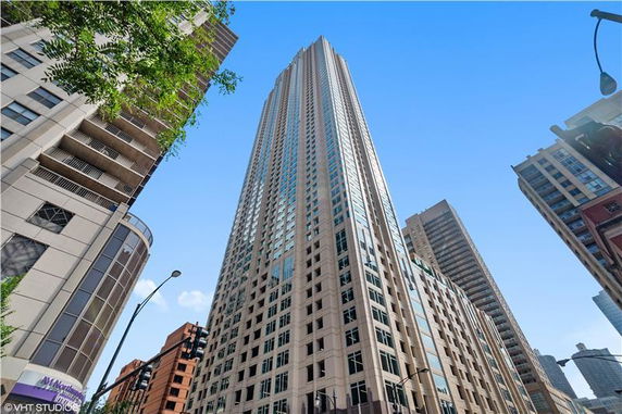 Front view of a tall skyscraper building.