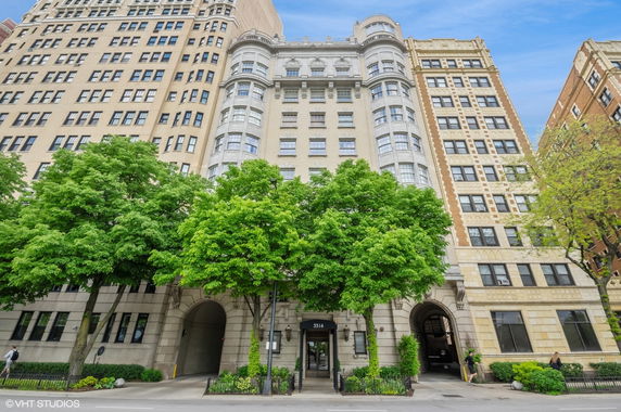 Front view of a multi-story building with architectural details.