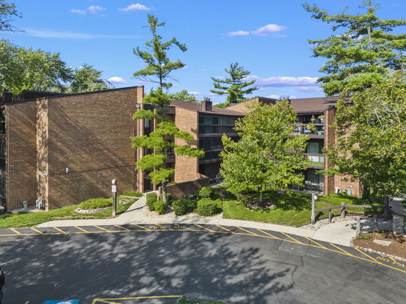 Front view of a multi-story brick building.