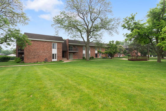 Front view of a multi-story brick building.