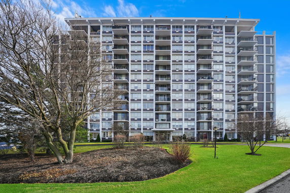 Front view of a multi-story apartment building.