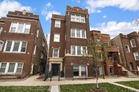 Front view of a multi-story brick building