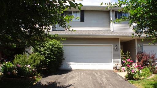Front view of a house with a two-car garage.