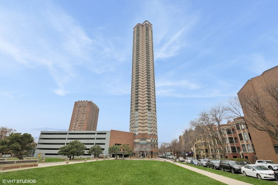 Front view of a tall multi-story building.