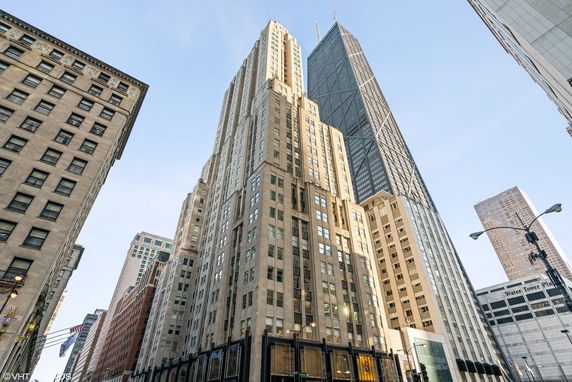 Front view of tall buildings in an urban setting.