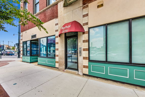 Front view of a building with a red awning labeled 'BayPoint 3175'.