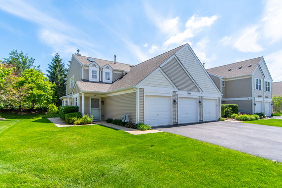 Front view of a two-story house with double garage.