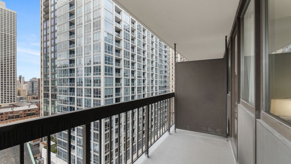Balcony view of high-rise buildings in an urban area.