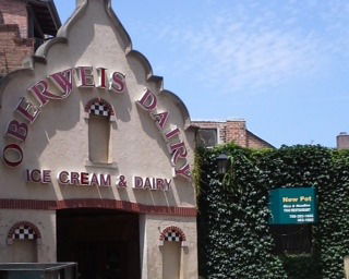 Front view of an ice cream and dairy store with a distinct architectural design.