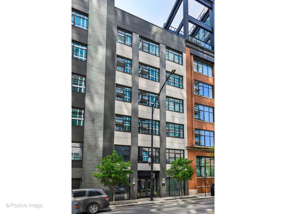 Front view of a multi-story modern building.