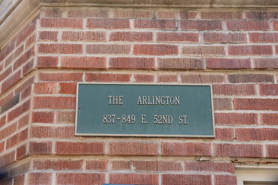 Brick exterior with a sign for 'The Arlington' at 837-849 E. 52nd St.