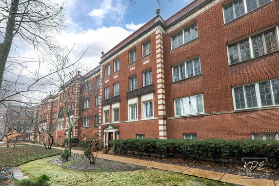 Front view of a multi-story brick building.