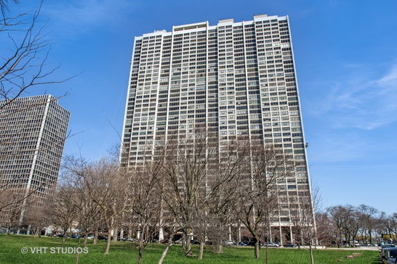 Front view of a high-rise building with many windows.