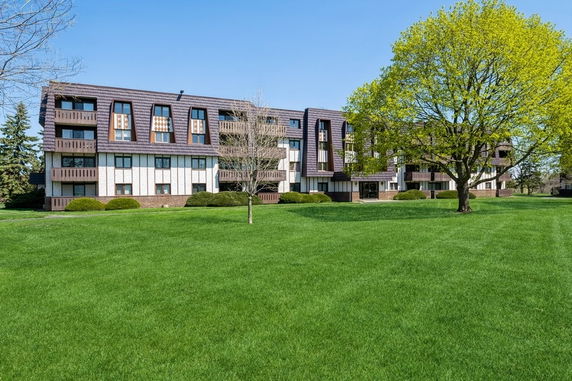 Front view of a multi-story apartment building.