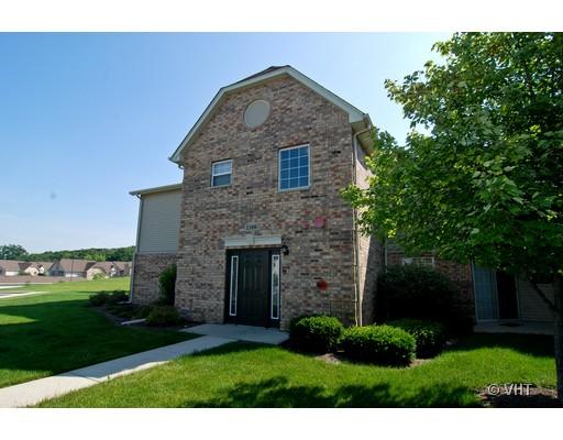 Front view of a two-story brick house.