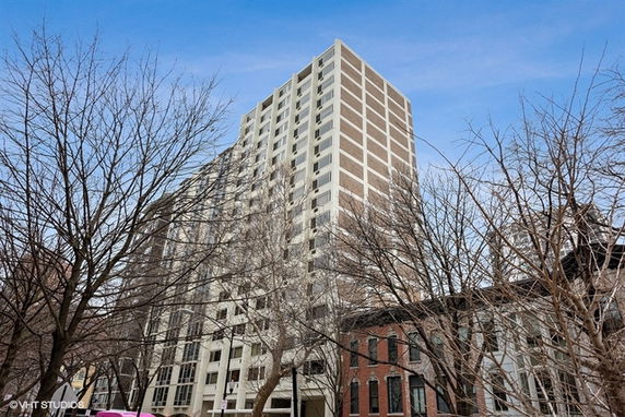 Front view of a tall residential high-rise building