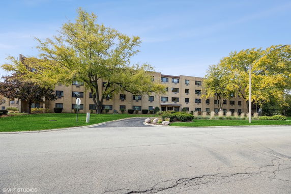 Front view of a multi-story apartment building.