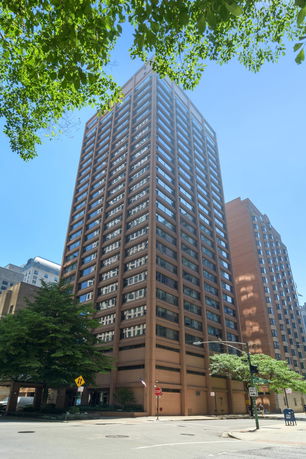 Front view of a tall multi-story building.