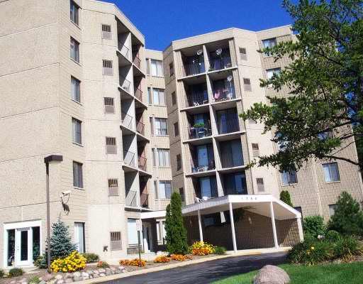 Front view of a multi-story apartment building.