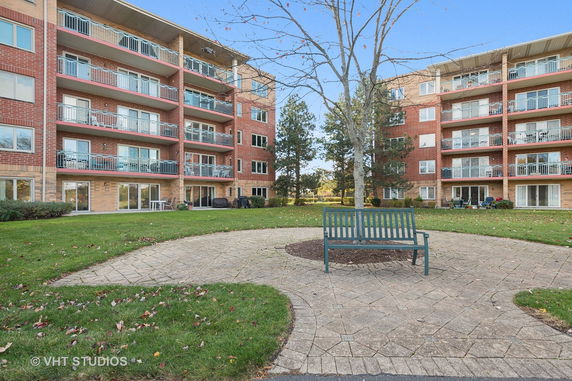 Front view of residential apartment buildings with balconies.