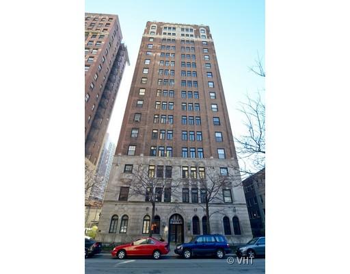 Front view of a multi-story brick building.