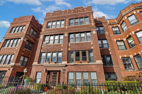 Front view of a multi-story brick building