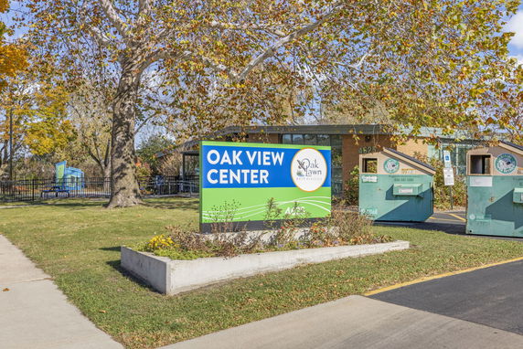 Front view of a building with signage for Oak View Center.