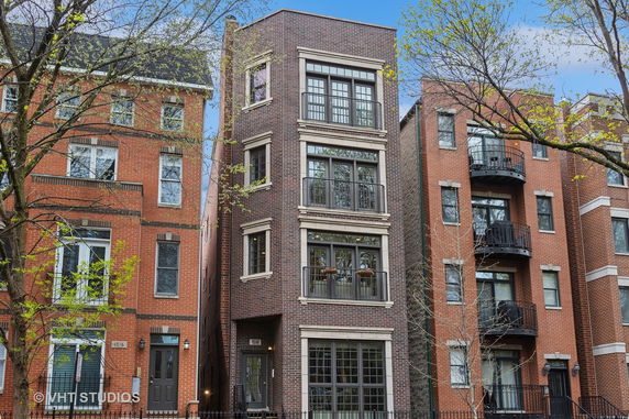 Front view of a multi-story brick building.
