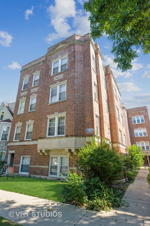 Front view of a multi-story brick building