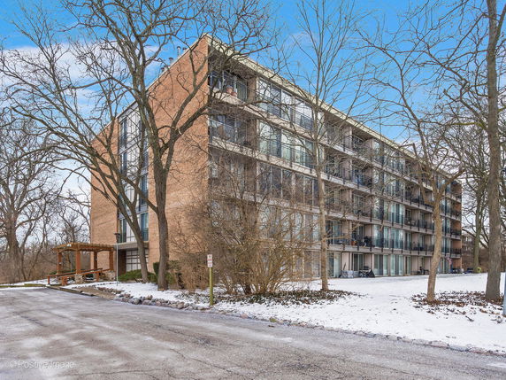 Front view of a multi-story apartment building.