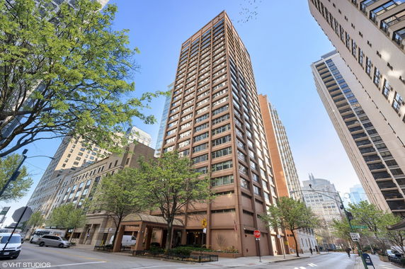 Front view of a tall residential building in an urban area