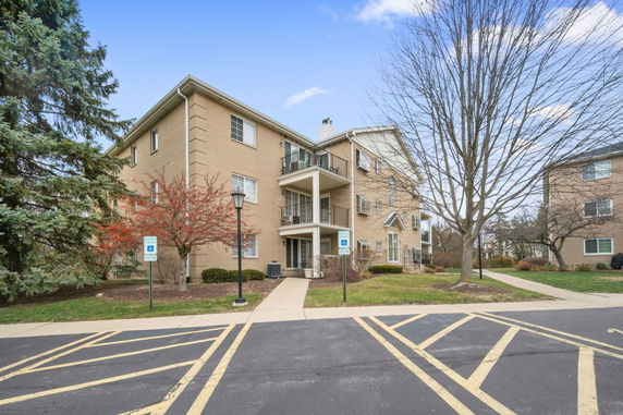 Front view of a multi-story apartment building.