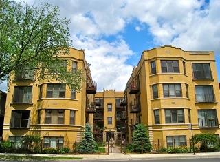 Front view of a multi-story apartment building.
