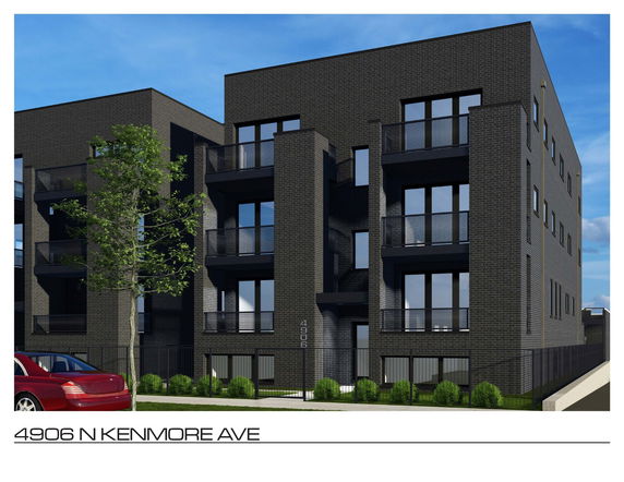 Front view of a multi-story modern apartment building.