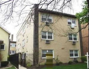 Front view of a three-story apartment building.