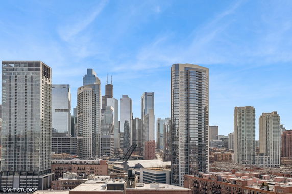 View of a city skyline with tall buildings and skyscrapers.