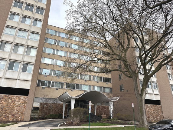 Front view of a multi-story apartment building.