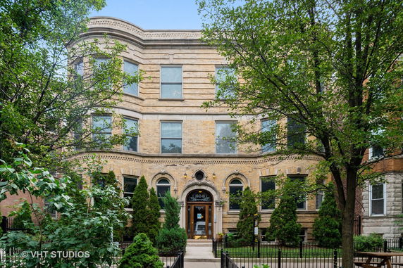 Front view of a multi-story building with classic architectural design.