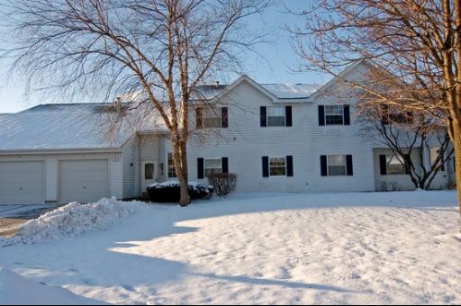 Front view of a two-story house with a double garage.
