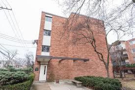 Front view of a multi-story brick building.
