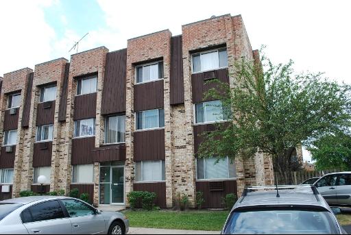 Front view of a multi-story residential building.