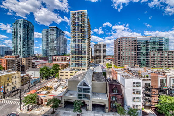 Wide angle view of urban high-rise buildings from above.