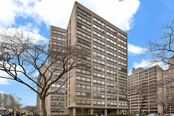 Front view of a multi-story apartment building.